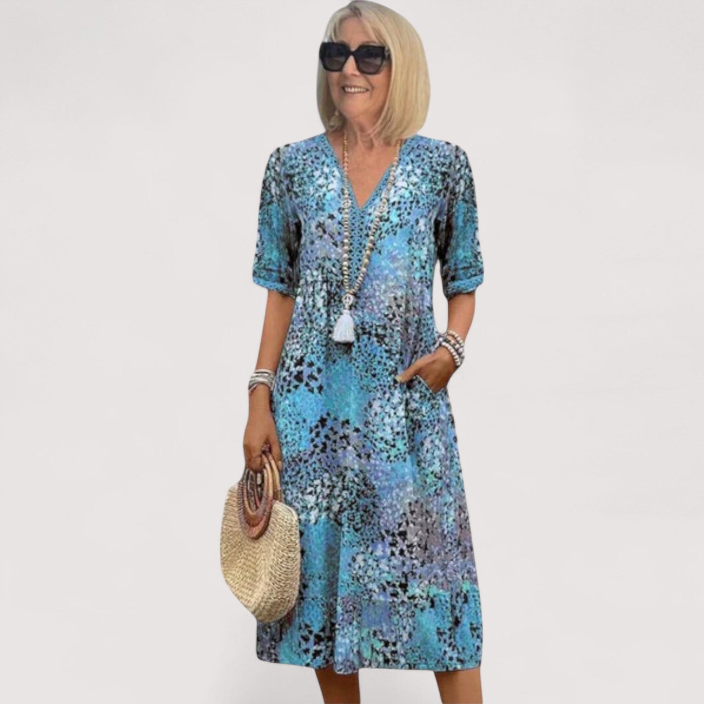 Damen Sommerkleid kurzarm Rundhals locker Passform Taschen atmungsaktiv bequem