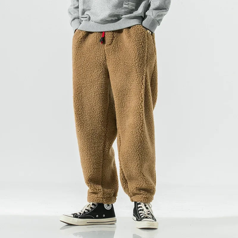 Herren Fleecehose warm gefüttert lockere Passform Kordelzugbund tiefe Taschen bequem