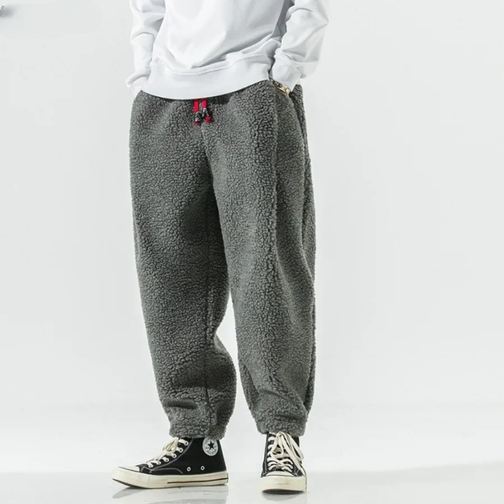 Herren Fleecehose warm gefüttert lockere Passform Kordelzugbund tiefe Taschen bequem